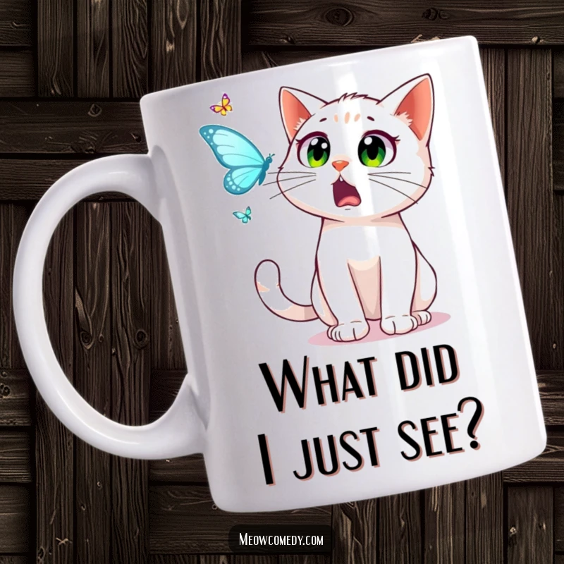 Funny surprised cat with wide eyes, startled expression, chasing a dancing butterfly across a mug, perfect for cat lovers.