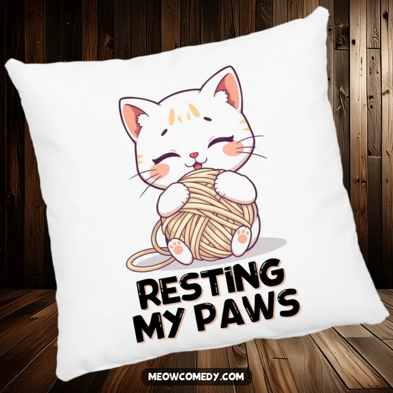 Funny kawaii cat comically tangled in a ball of yarn, a soft and humorous decorative pillow.