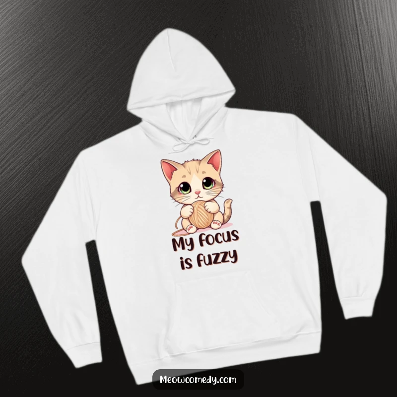 Funny Cat Hoodie showing a cute kitten with big eyes playfully batting a ball of yarn, designed for comfort and feline-inspired humor.