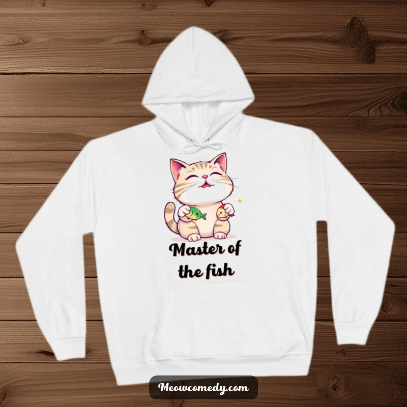 Funny content cat, purring loudly, juggling three small fish toys, on a cozy hoodie, perfect for relaxation and humor.