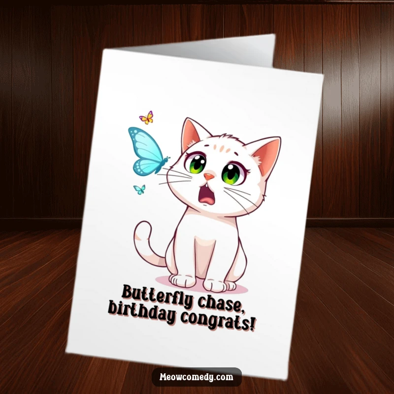 Funny Free Printable Birthday Card: Startled cat with wide eyes intensely follows a whimsical dancing butterfly.