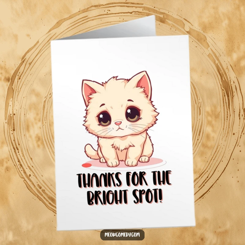 Funny Free Printable thank you card of a fluffy cat with massive round eyes playing with a red laser dot.