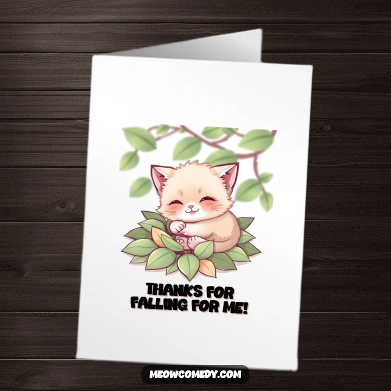 Funny Free Printable Thank You Card: A tiny cat happily rolls in soft leaves, a sweet and cozy way to say thanks.