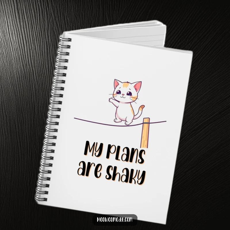 Funny notebook featuring a cat balancing on a tightrope fence, ideal for jotting down funny notes.