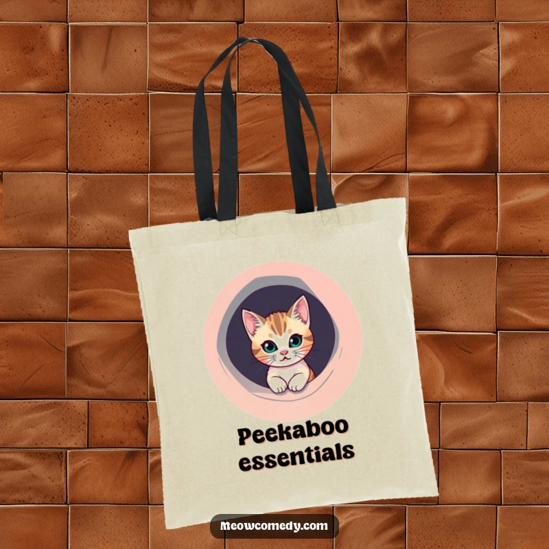 Funny Cat Tote Bag: A mischievous cat peeks from a round, colorful hole, perfect for carrying your essentials with flair.